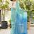 aqua blue linen saree with hand embroidered floral motifs