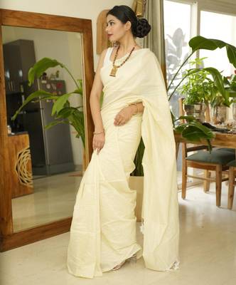 ethereal elegance ivory handwoven saree with subtle stripes 2