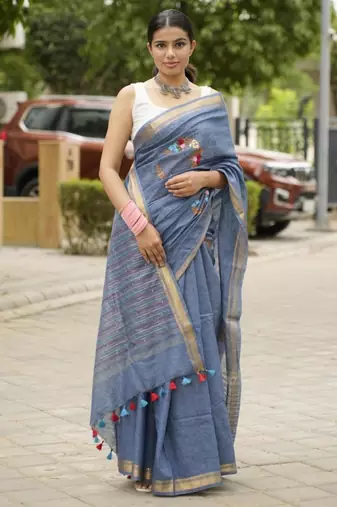 handwoven blue linen saree with tassel & hand embroidery