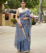 handwoven blue linen saree with tassel & hand embroidery