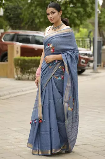 handwoven blue linen saree with tassel & hand embroidery