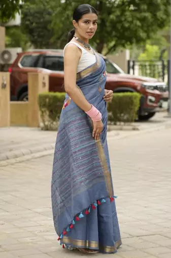 handwoven blue linen saree with tassel & hand embroidery