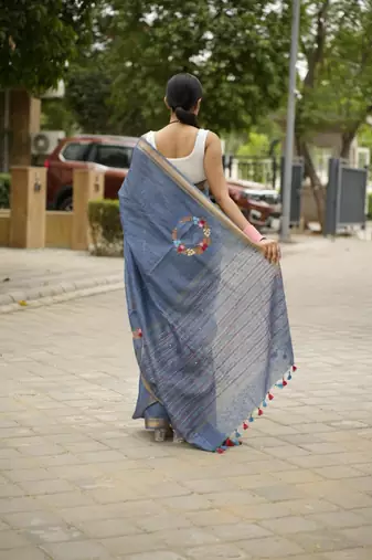 handwoven blue linen saree with tassel & hand embroidery