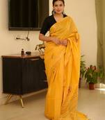 sunlit mustard linen saree with zari border & floral embroidery