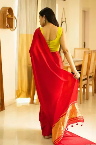 crimson glow red silk blend saree with gold zari border
