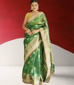 green banarasi saree with zari border