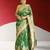 green banarasi saree with zari border