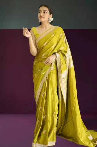 green banarasi silk saree with zari border