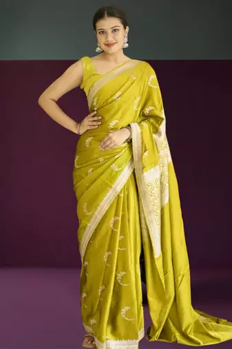 green banarasi silk saree with zari border