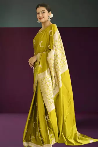 green banarasi silk saree with zari border