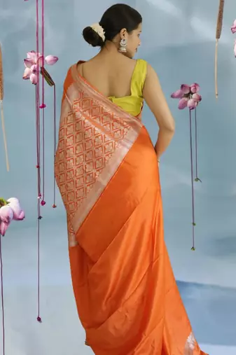 orange banarasi silk saree with zari border