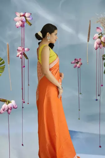 orange banarasi silk saree with zari border