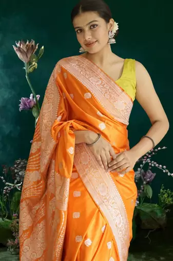 orange banarasi silk saree with zari border