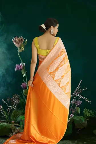 orange banarasi silk saree with zari border