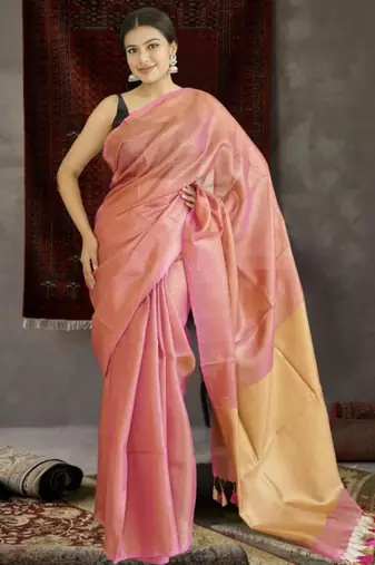 orange tissue linen saree with golden zari pallu