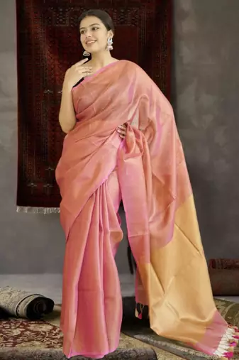 orange tissue linen saree with golden zari pallu