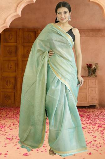 green tissue linen saree with zari border
