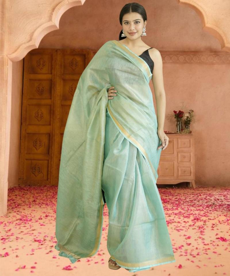 green tissue linen saree with zari border