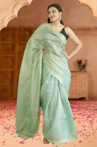 green tissue linen saree with zari border