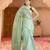green tissue linen saree with zari border