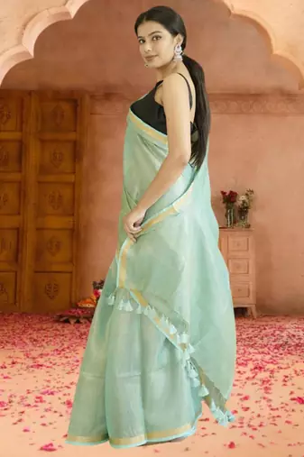 green tissue linen saree with zari border
