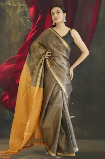 grey tissue linen saree with golden zari pallu