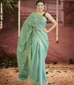 green linen silk blend saree with zari border