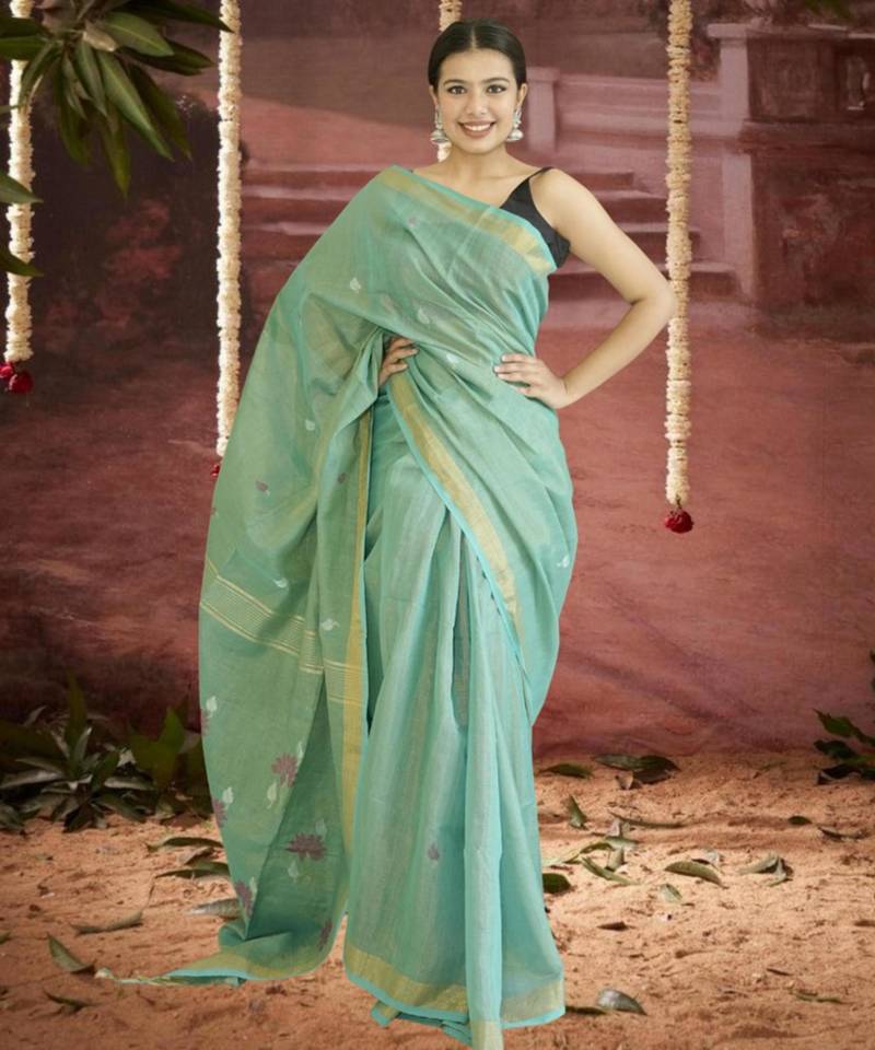 green linen silk blend saree with zari border