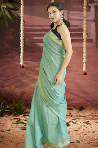green linen silk blend saree with zari border