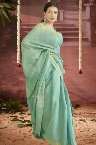 green linen silk blend saree with zari border