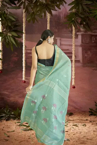 green linen silk blend saree with zari border