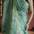 green linen silk blend saree with zari border