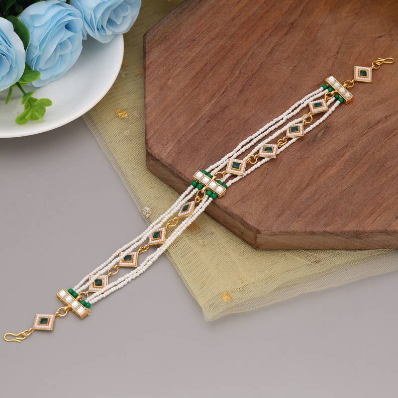 Green & white color kundan matha patti