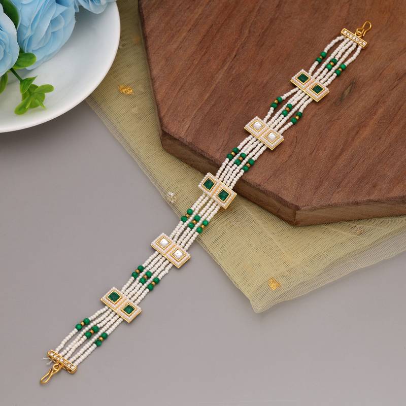 Green & white color kundan matha patti