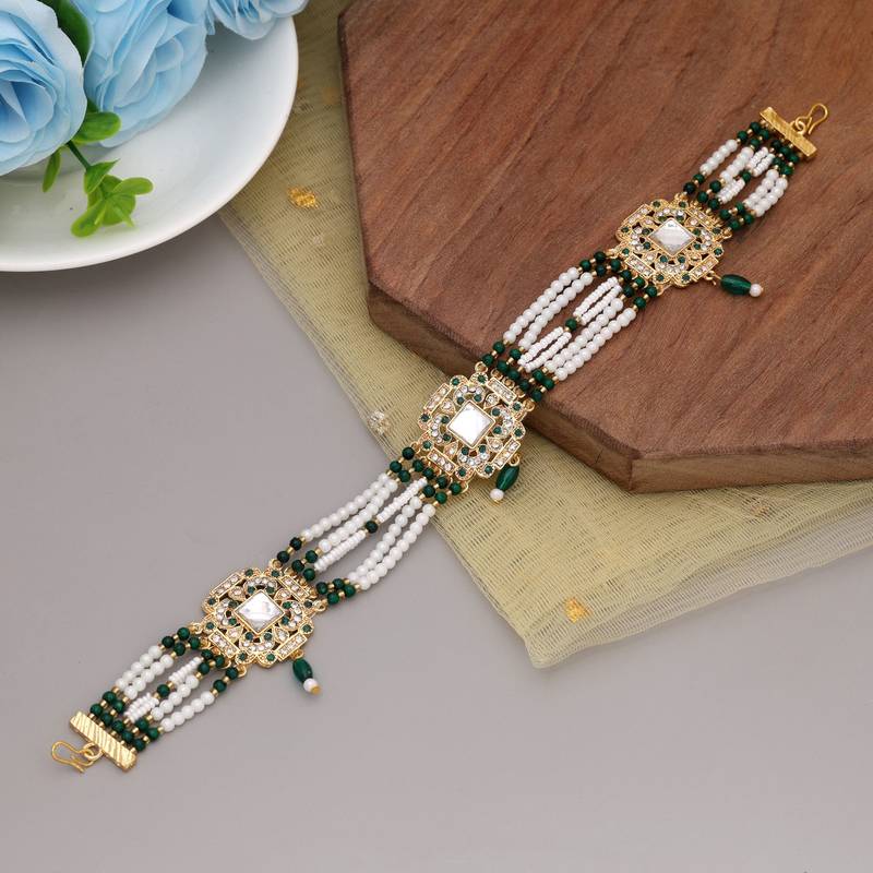 Green & white color kundan matha patti