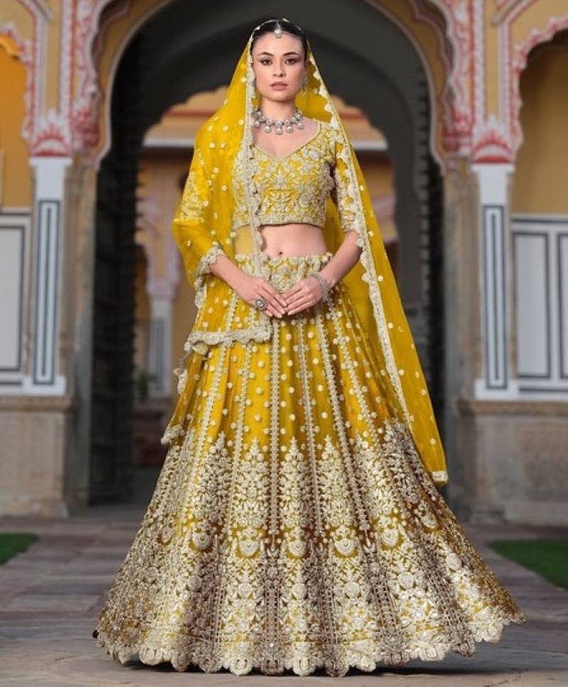 Yellow Net Semi Stitched Lehenga Choli with Stone Embroidery Work