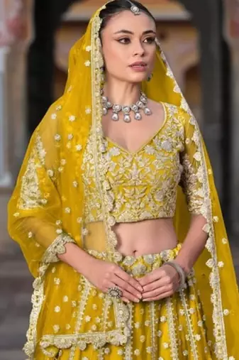 Yellow Net Semi Stitched Lehenga Choli with Stone Embroidery Work