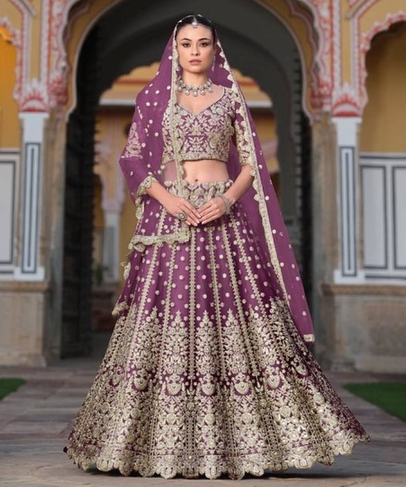 purple net lehenga choli with stone embroidery work