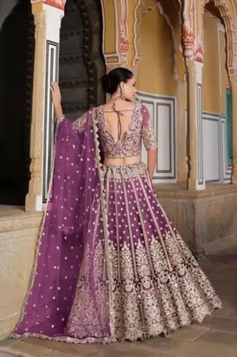purple net lehenga choli with stone embroidery work