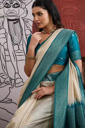 cream and teal handloom weaving silk blend saree