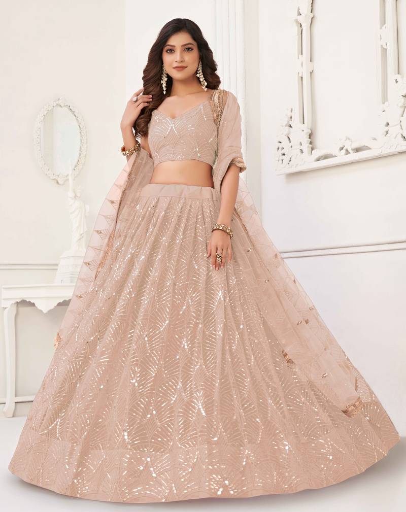 PEACH NET SEQUIN EMBROIDERED LEHENGA SET WITH CHOLI AND DUPATTA