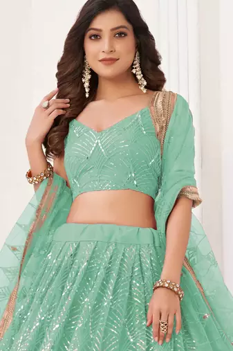 SEA GREEN NET SEQUIN EMBROIDERED LEHENGA SET WITH CHOLI AND DUPATTA