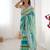 sky blue chinon leriya zari printed saree with elegant border