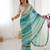 sky blue chinon leriya zari printed saree with elegant border