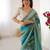 sky blue chinon leriya zari printed saree with elegant border