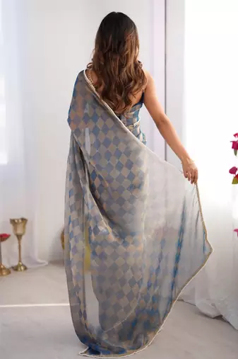 blue chiffon designer saree with box pattern and moti lace border