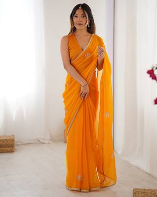 Women's yellow soft fendy embroidered designer saree with blouse 1
