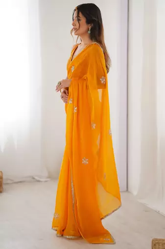 Women's yellow soft fendy embroidered designer saree with blouse