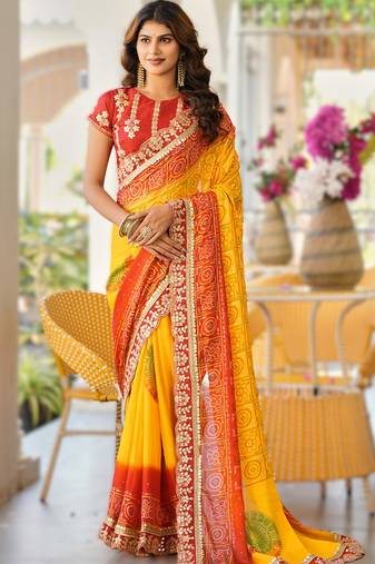  yellow fancy print bandhani saree  heavy moss chiffon with heavy work blouse