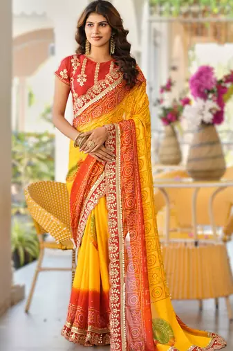  yellow fancy print bandhani saree heavy moss chiffon with heavy work blouse